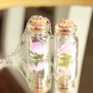 Enchanted pink rose in a vial necklace